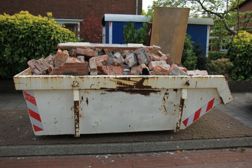 Professional workers clearing a flat in Richmond