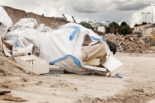 Business waste being loaded for removal in Richmond Upon Thames